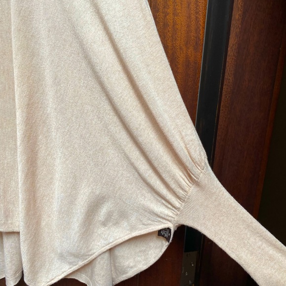 Cowl-neck collar/off-shoulder bat-wing sweater in cream. - Picture 3 of 6